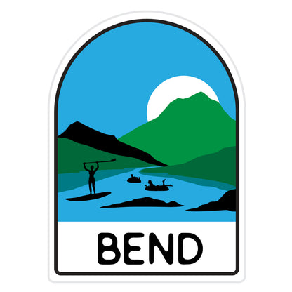 Bend Oregon Sticker. Featuring the iconic pastime of summer fun in the Deschutes River, our sticker showcases the breathtaking beauty of the Deschutes River, the majestic Cascade Mountains, and the late-setting sun to an almost endless day. Stick it on your water bottle, laptop, or travel gear to carry a piece of Bend wherever you go. It's not just a sticker; it's a visual celebration of the unique charm and energy that defines Bend, Oregon.